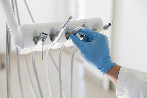 Professional Invisalign Clear Aligners technician working in Okmulgee, OK